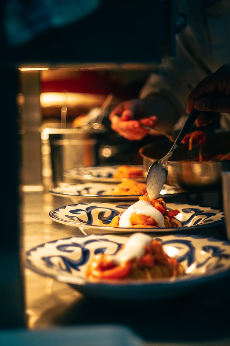 a person is preparing food on a plate